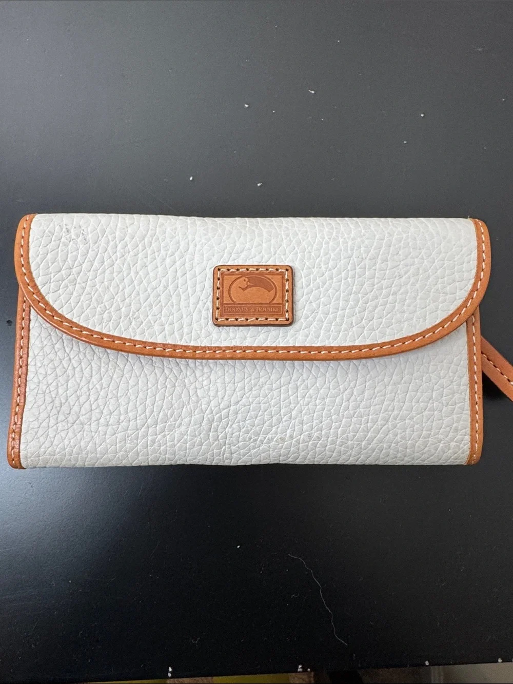 Dooney & Bourke White Pebbled Leather Wristlet with Tan Trim